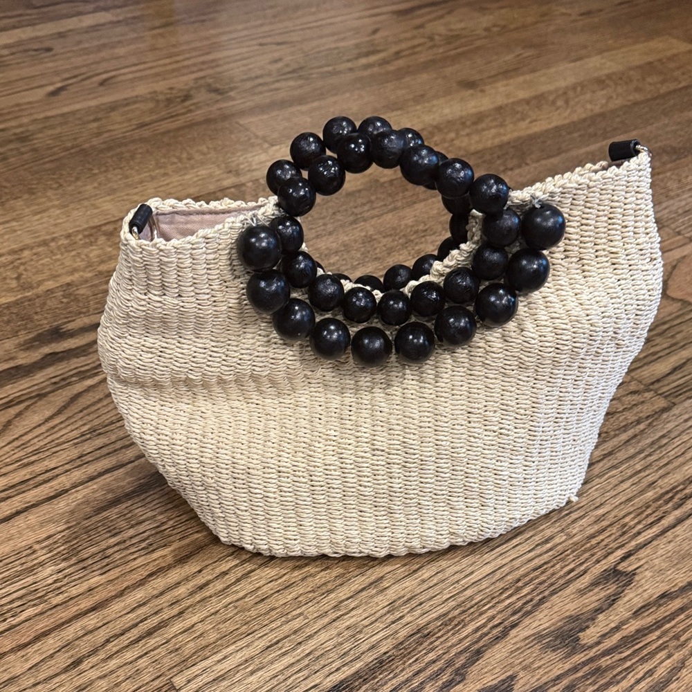 Elegant Cream Woven Handbag with Black Beaded Handle